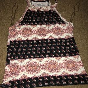Geometric halter tank